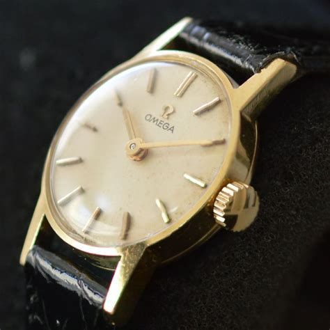 ladies gold omega watch 1960.